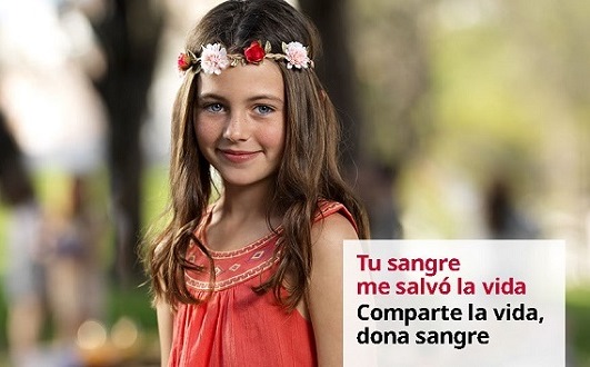 Imagen de una niña vestida de rojo con el lema "Tu sangre me salva la vida. Comparte la vida, dona sangre"