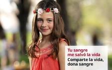 Imagen de una niña vestida de rojo con el lema "Tu sangre me salva la vida. Comparte la vida, dona sangre"