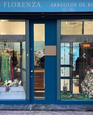 Puerta acristalada de la tienda de Angélica 